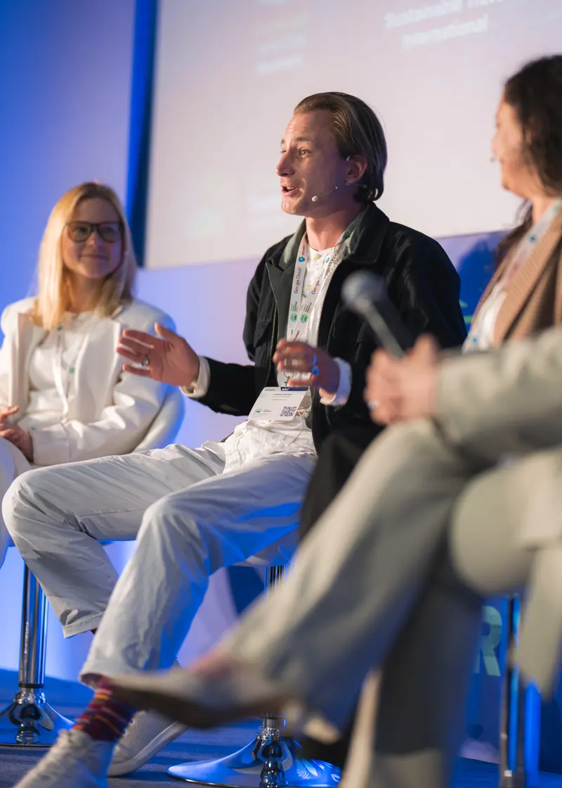 Connor Bryant speaking on a panel at the London Climate Tech Show